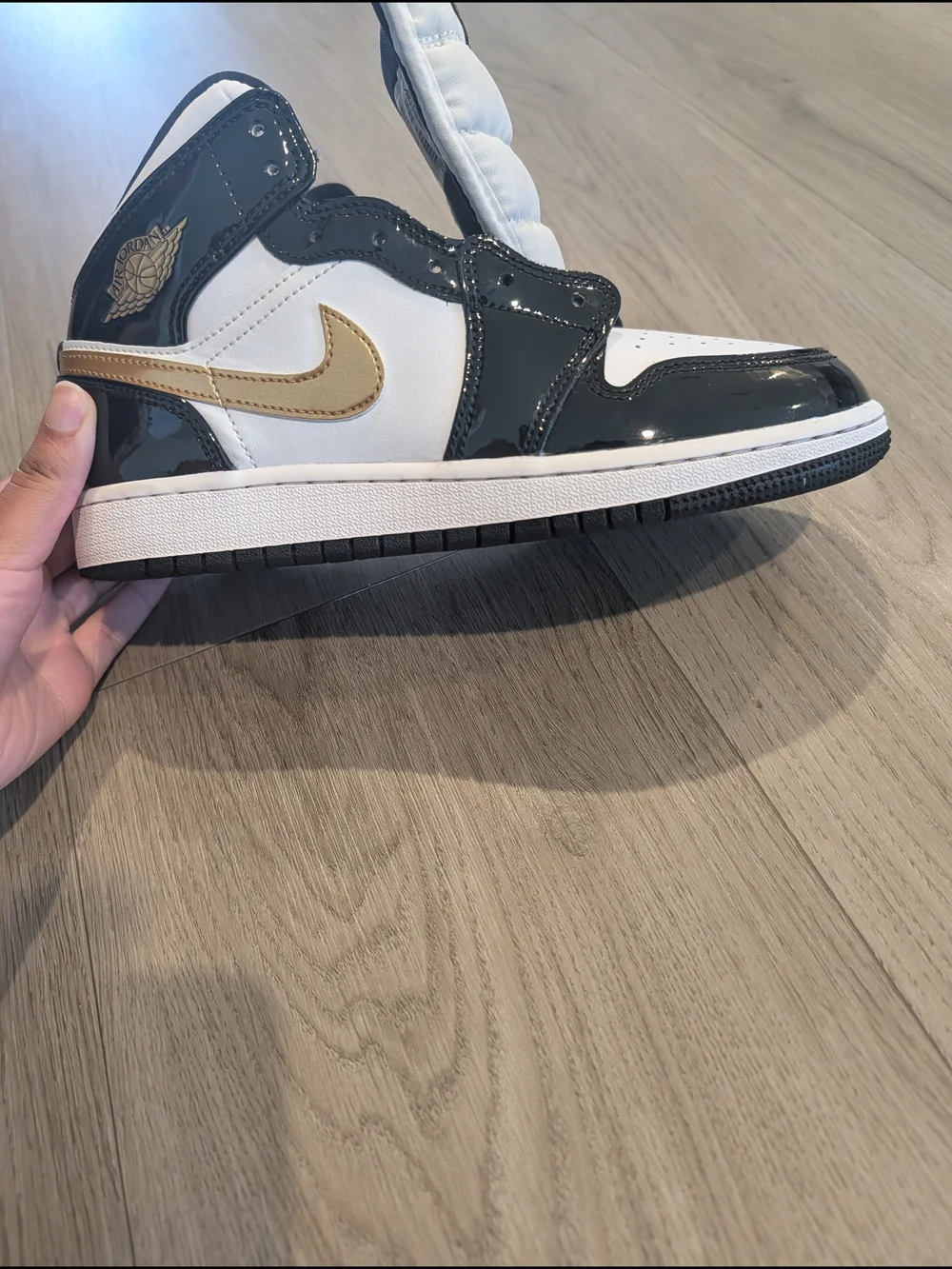 Jordan Kids High-Top Sneakers in White, Black, and Gold